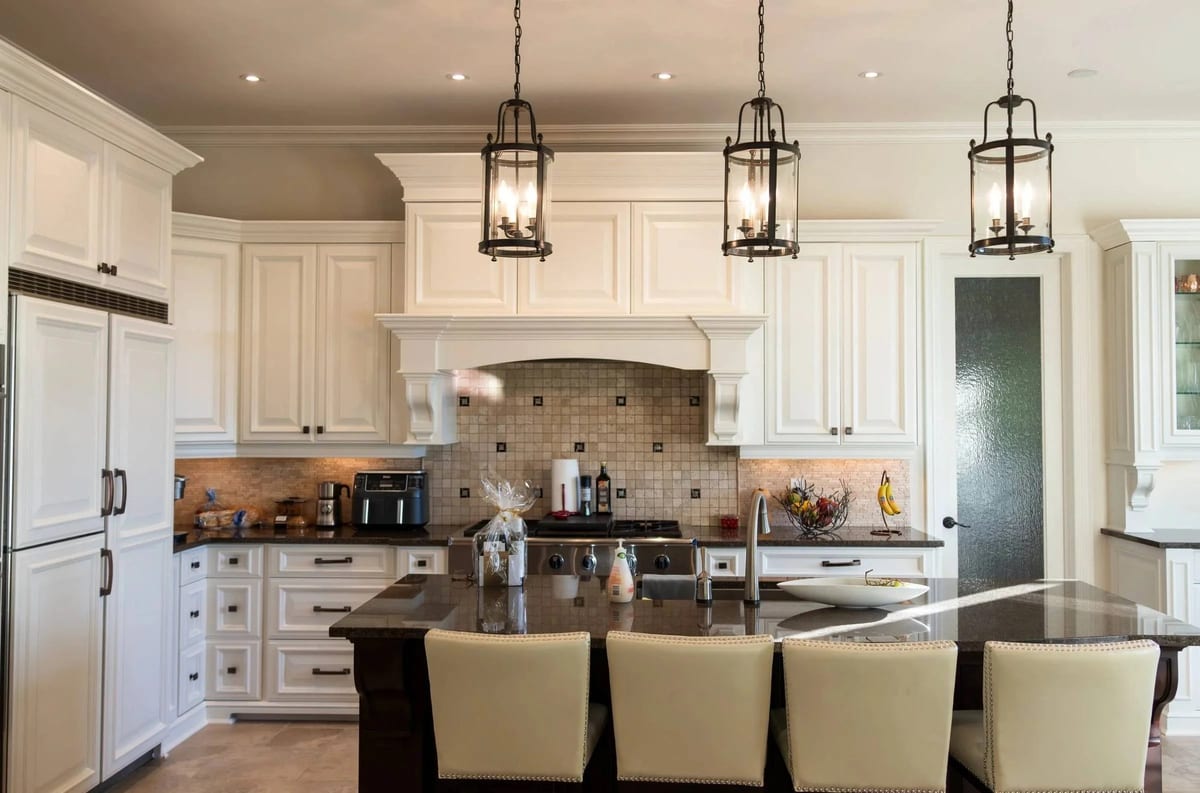 Freshly painted white kitchen cabinets finished by McHugh Painting
